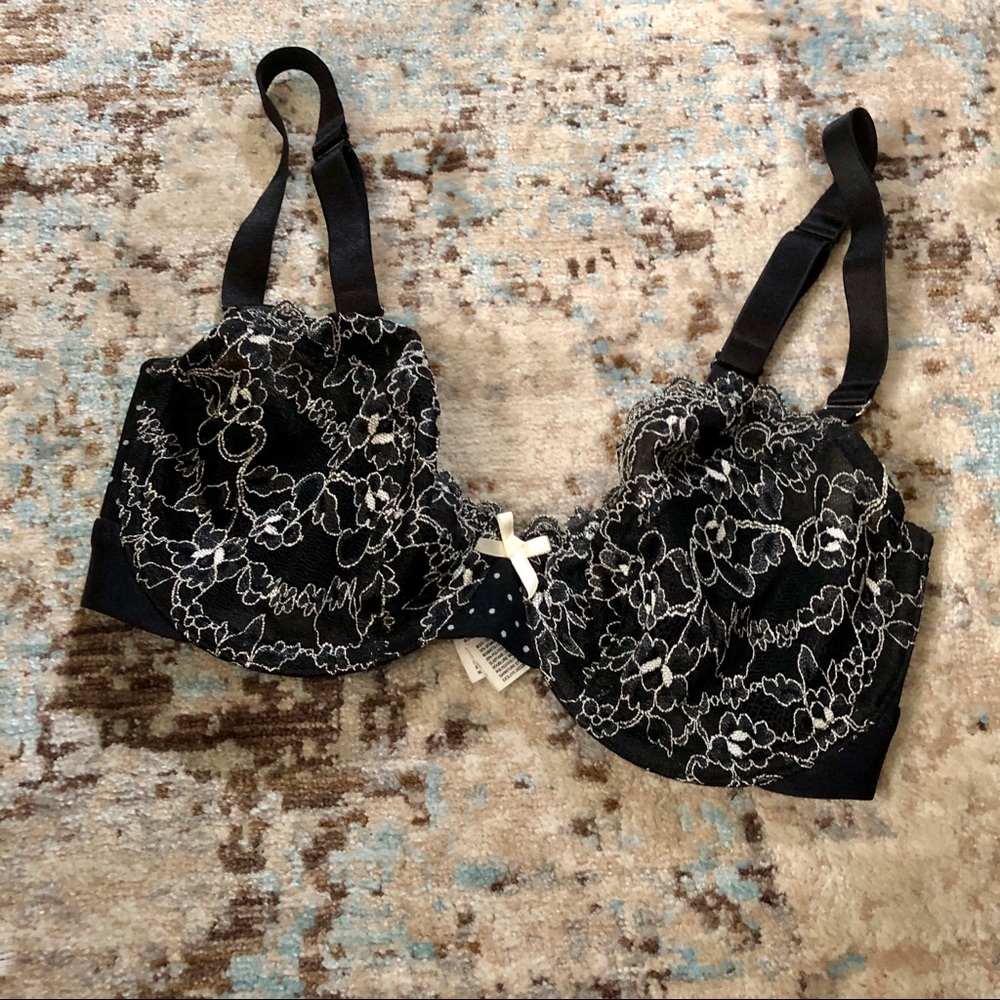 B.tempt’d black lace bra with white details